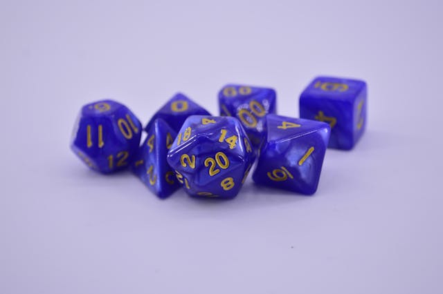 Blue multi-sized dice with numbers