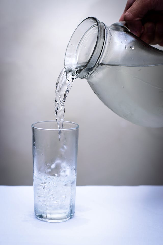 homework success:  picture of water being poured into a glas