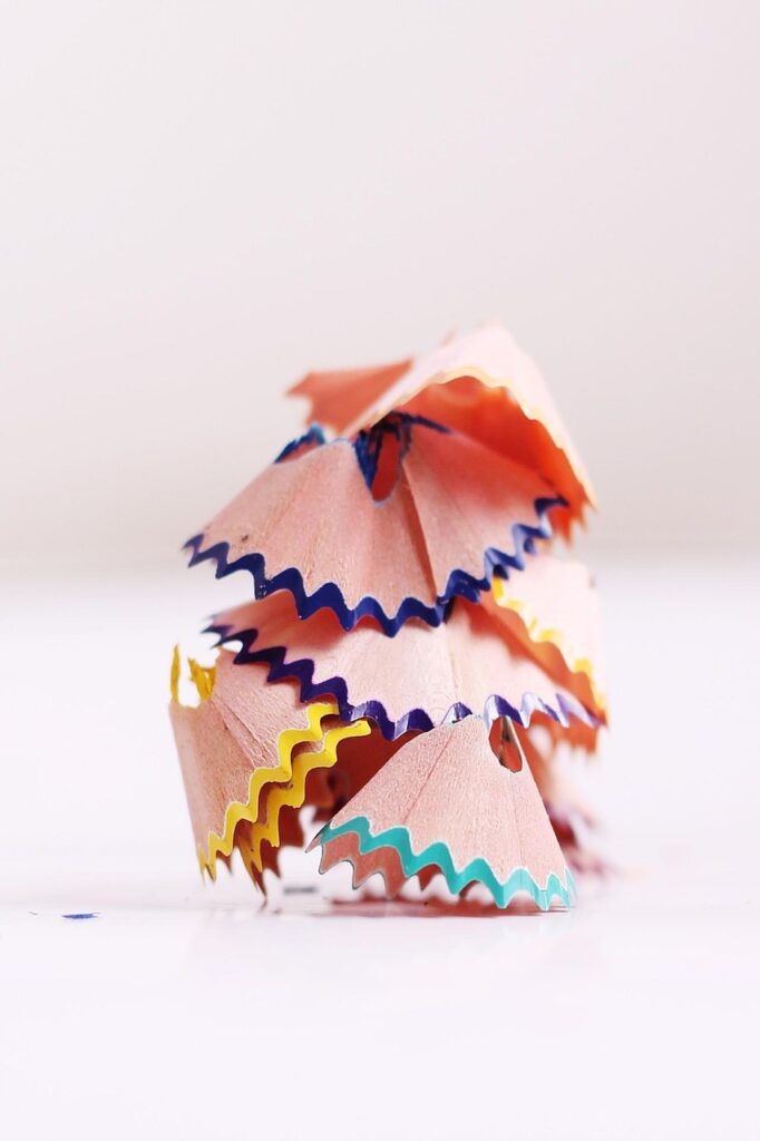 trash, shavings, colored pencils, pencil shavings, waste, trash, trash, pencil shavings, waste, waste, waste, waste, waste